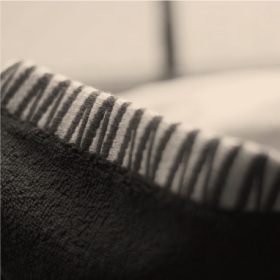 「NV」モチーフ織り柄